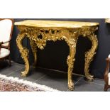 an 1848 dated Louis XV style Napoleon III console in gilded and richly sculpted wood with a thick