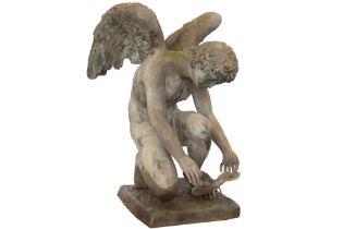 bronze garden sculpture depicting a winged youth with dragonfly || Tuinsculptuur in brons met een