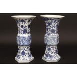 pair of Chinese vases (with a hexagonal base) in marked porcelain with a floral blue-white