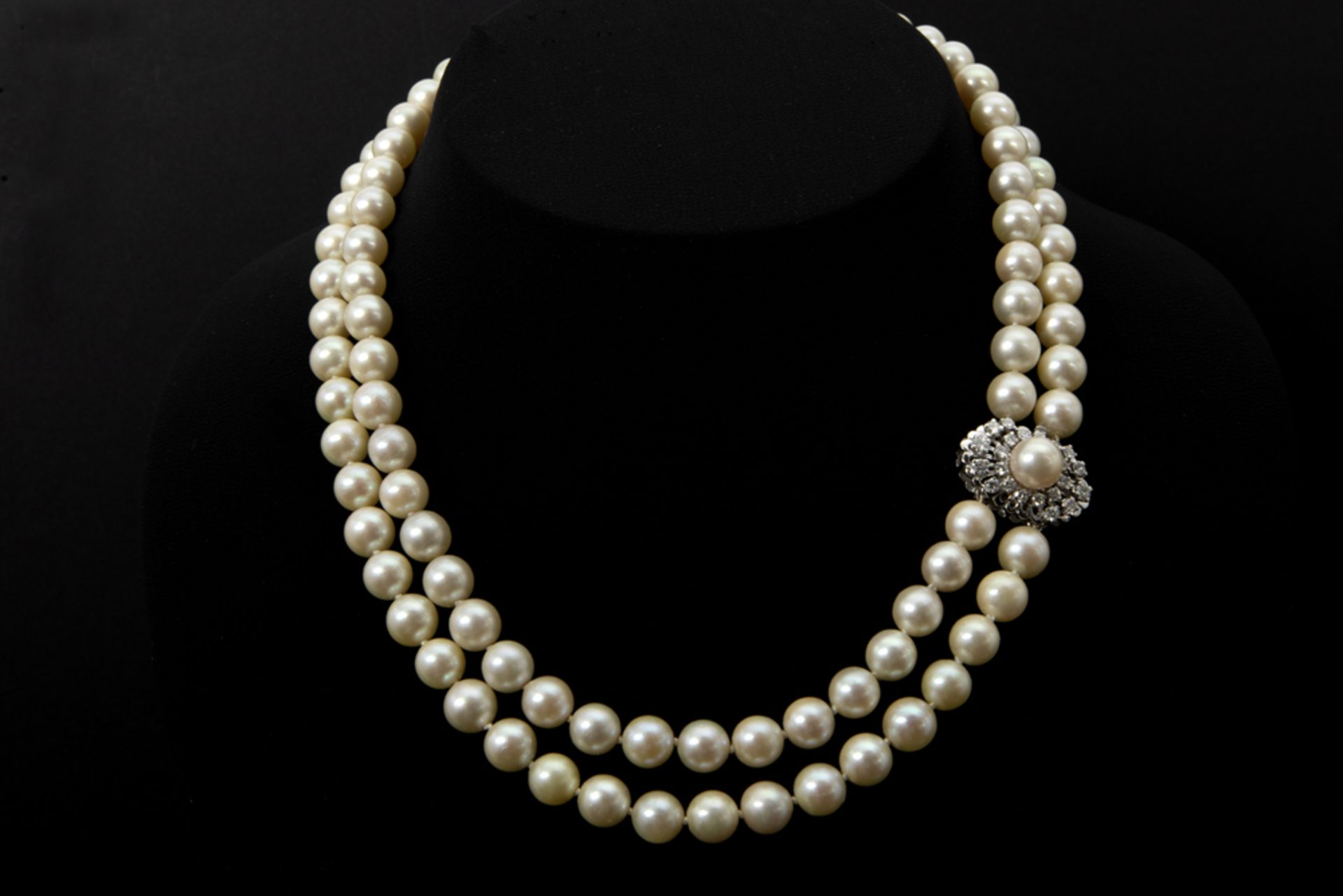 1970's necklace with two rowes of pearls and with a quite big lock in white gold (18 carat) with