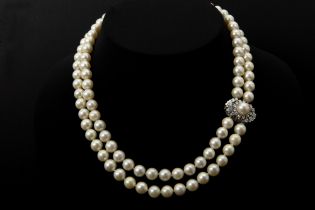 1970's necklace with two rowes of pearls and with a quite big lock in white gold (18 carat) with