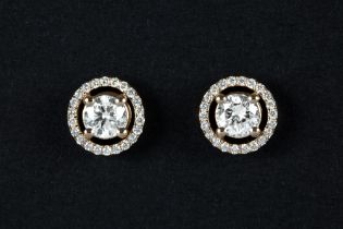 nice pair of earrings in yellow gold (18 carat) each with a ca 0,50 carat quality brilliant cut