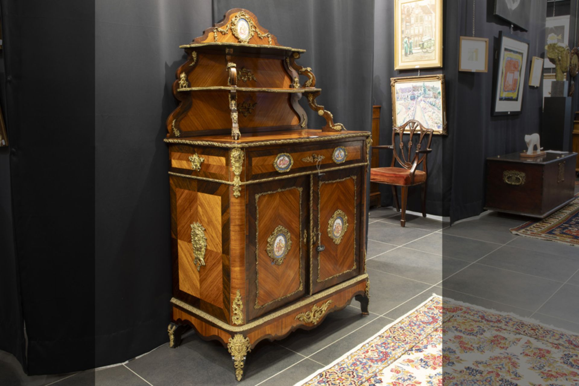 small 19th Cent. French Napoleon III cabinet in rosewood with porcelain plaques and gilded bronze ||