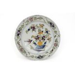18th Cent. dish in ceramic from Delft with a polychrome decor with birds || Achttiende eeuwse schaal