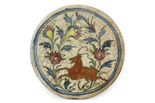 Persian ceramic plaque with a polychrome decor || Perzische plaket in faïence met een polychroom