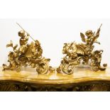 beautiful pair of antique chenets in gilded bronze each with a Cupid and a dragon || Fraai paar