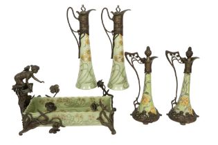 five pieces of Art Nouveau style ceramic with bronze mountings and whiplash ornamentation : four