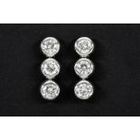 beautiful pair of earrings in white gold (18 carat) each with three brilliants - in total : ca 1,
