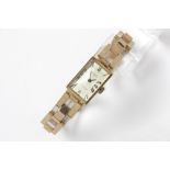 fifties' vintage mechanical "Emka" marked ladies' wristwatch with band in pink gold (18 carat) ||