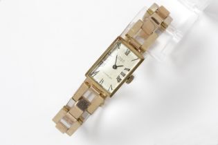 fifties' vintage mechanical "Emka" marked ladies' wristwatch with band in pink gold (18 carat) ||