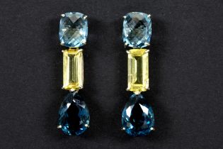pair of earrings in white gold (18 carat) with ca 3 carat of light yellow Beryl and at least 15