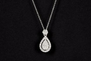 dropshaped pendant in white gold (18 carat) with ca 0,25 carat of high quality brilliant cut