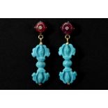 pair of Nepalese earrings in pink gold (18 carat) each with a ruby with an inlaid diamond and a