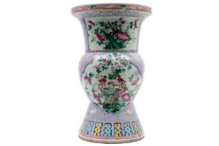 early 19th Cent. Chinese (spittoon) vase in porcelain with a 'Famille Rose' garden decor with two