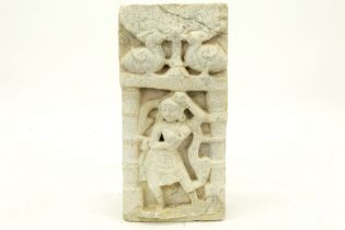 antique Indian temple sculpture in sandstone with the depiction of a river godess (Ganga or