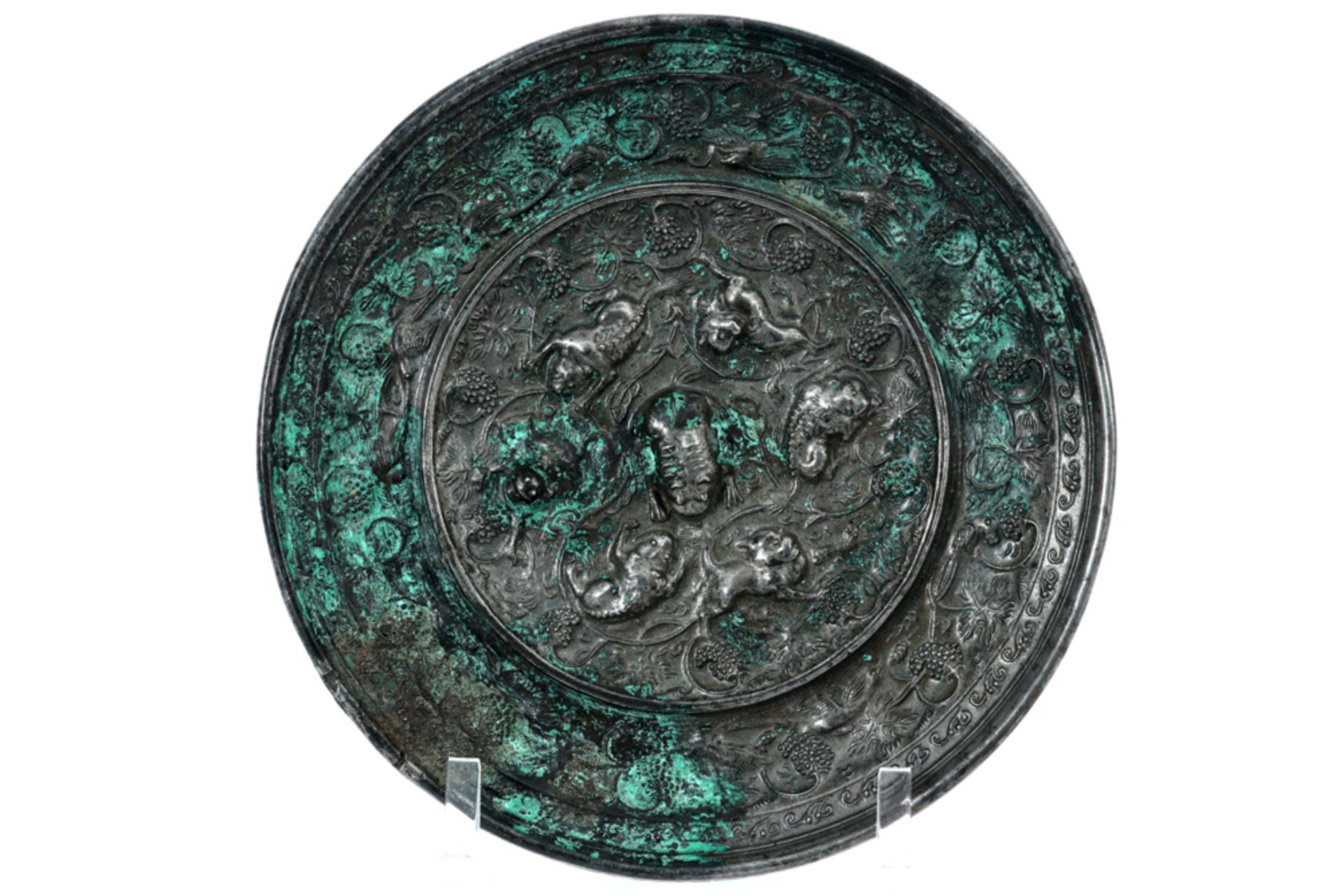 Chinese Tang Dynasty bronze mirror with the depictions of grapevines, birds and mythical