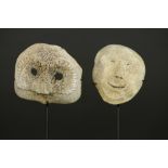 two Inuit masks in cetacean bone : one from Alaska (human face) and one early 20th Cent. of the '