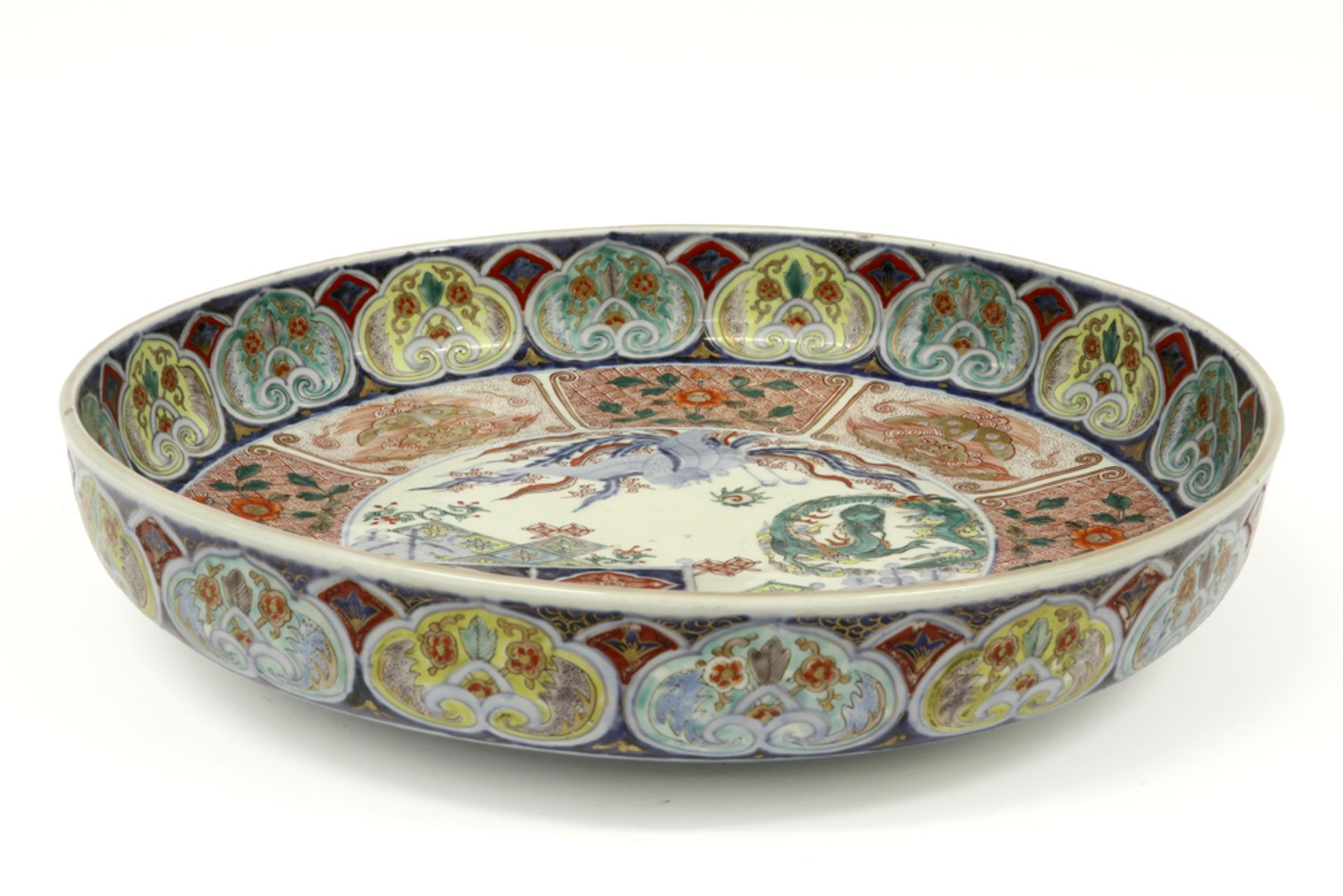quite large 18th Cent. Japanese bassin in porcelain with a rich Imari decor with phoenix and - Image 2 of 3