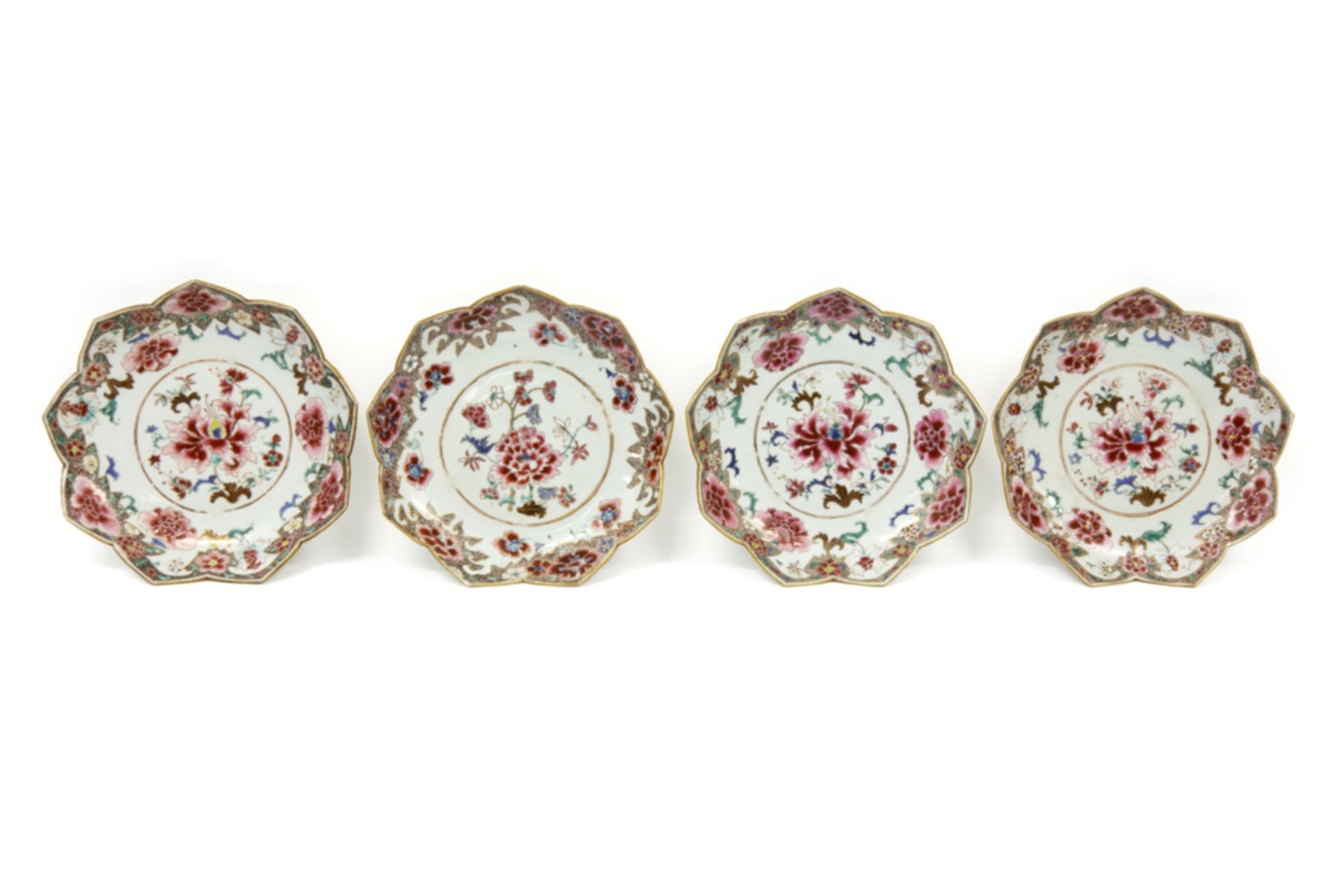 series of four 18th Cent. plates in Chinese porcelain with a 'Famille Rose' flower decor || Serie