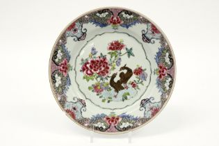 18th Cent. Chinese plate in porcelain with a 'Famille Rose' decor with birds in a garden ||