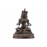 old Himalayan, presumably Nepalese, "Sitting Aalokitesvara with Ruyi wheel" sculpture in a copper