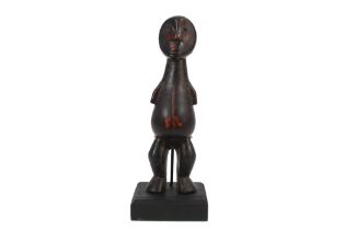 Congolese "Lega" antropomorphic figure sculpture in bone with typical features on the face and of
