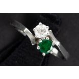 ring in white gold (18 carat) with a ca 0,20 carat emerald and a ca 0,25 carat of high quality