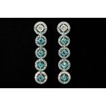 very elegant pair of earrings in white gold (18 carat) with at least 3 carat of Topaz and ca 1 carat