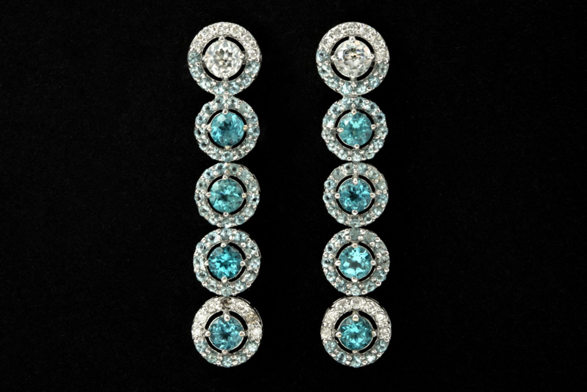 very elegant pair of earrings in white gold (18 carat) with at least 3 carat of Topaz and ca 1 carat