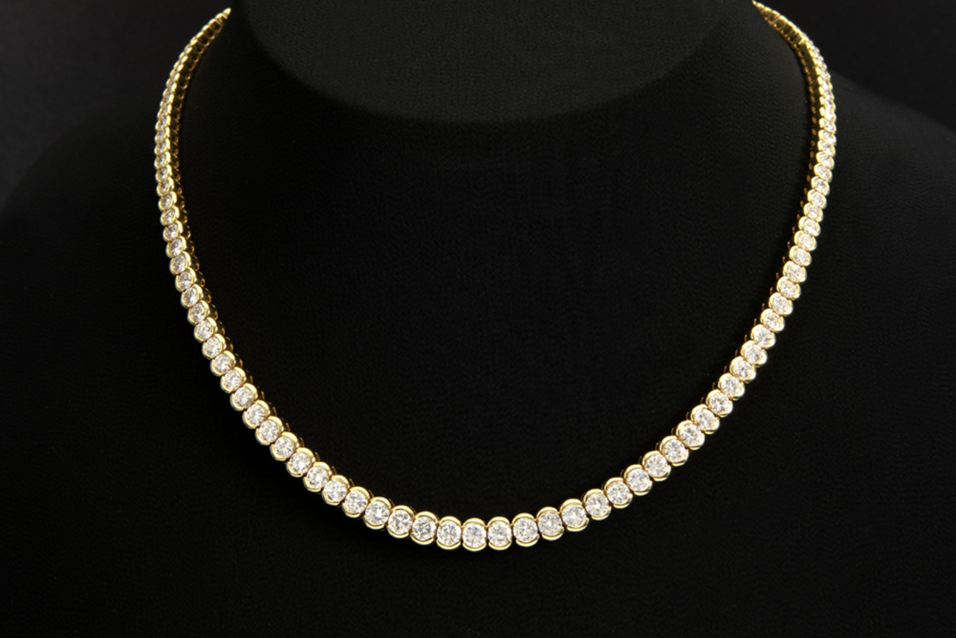 superb necklace in yellow gold (18 carat) with at least 12 carat of very high quality brilliant