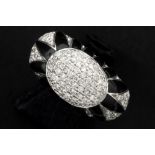 ring in white gold (18 carat) with black enamel and more then 0,80 carat of high quality brilliant