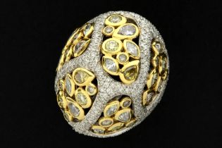 matching ring in yellow and white gold (18 carat) with ca 6,50 carat of white (G) and natural
