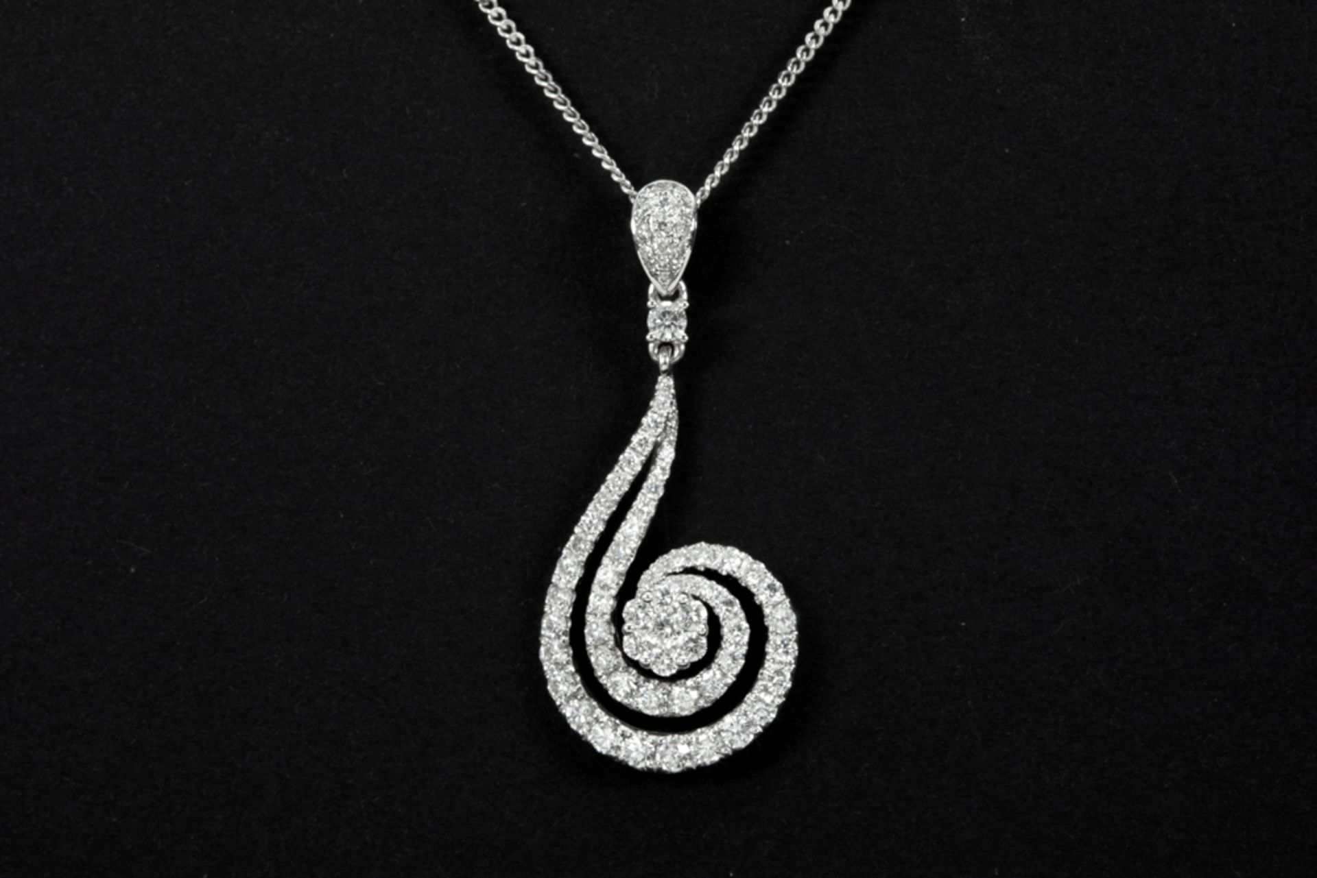 spiral shaped pendant in white gold (18 carat) with more then 1,30 carat of high quality brilliant