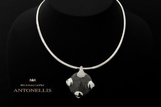 Antonellis signed pendant in yellow and white gold (18 carat) with at least 4,20 carat of black