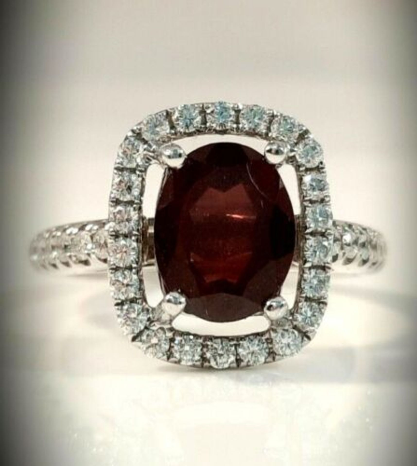 DIAMOND AND GARNET DRESS RING/WHITE GOLD