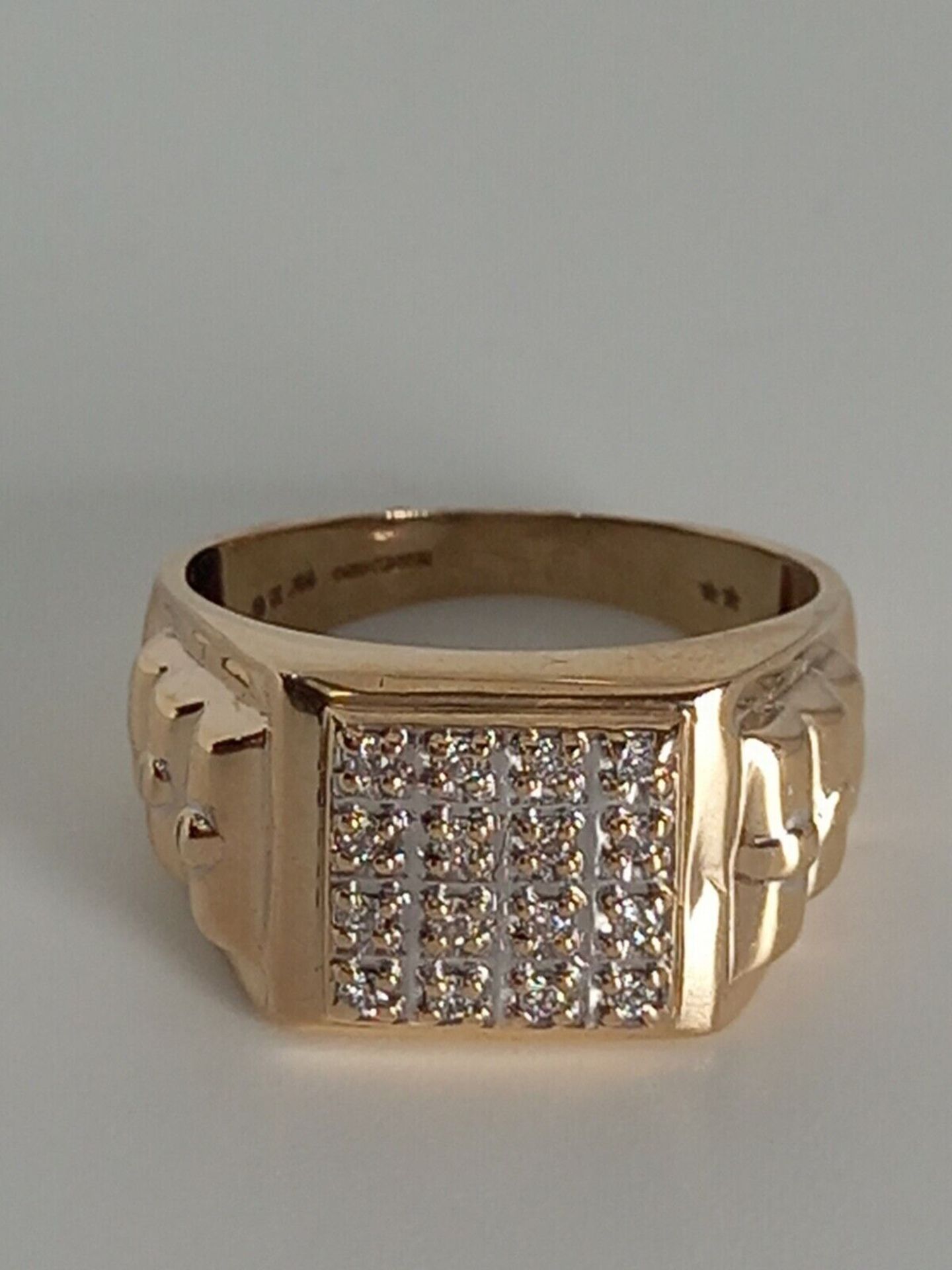 SIGNET RING FEATURES 16 DIAMONDS IN A LUX PAVE SETTING, ENCLAVED IN 9CT YELLOW GOLD