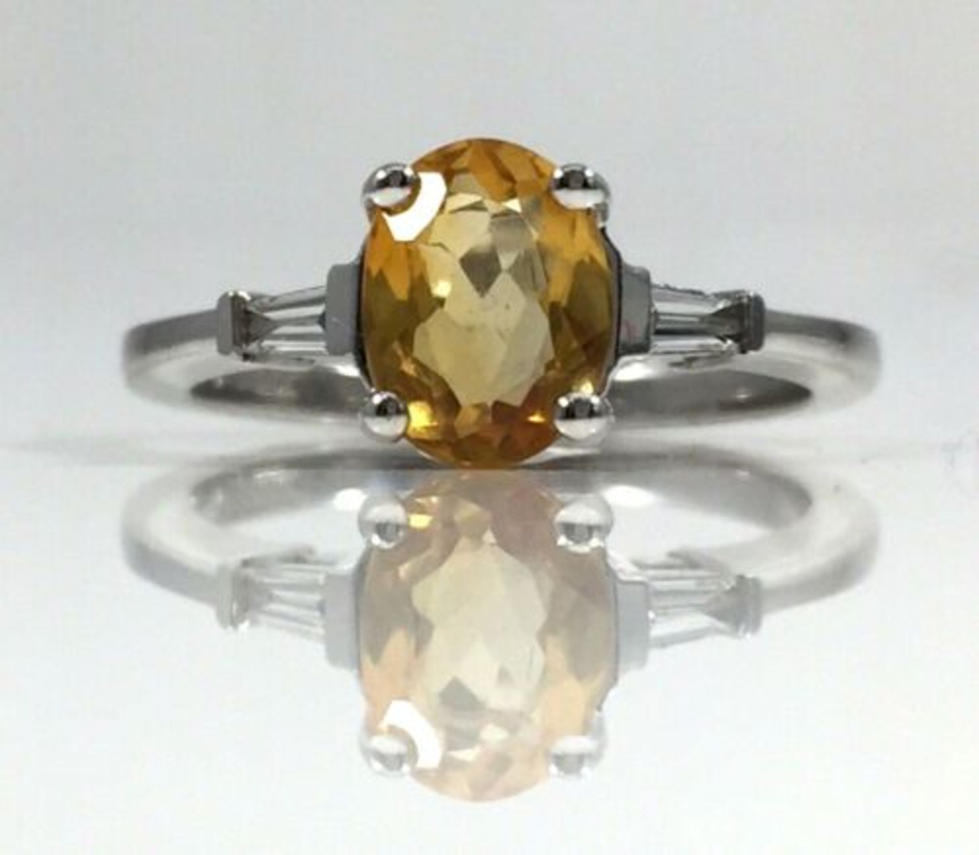 OVAL CITRINE AND DIAMOND RING IN WHITE GOLD