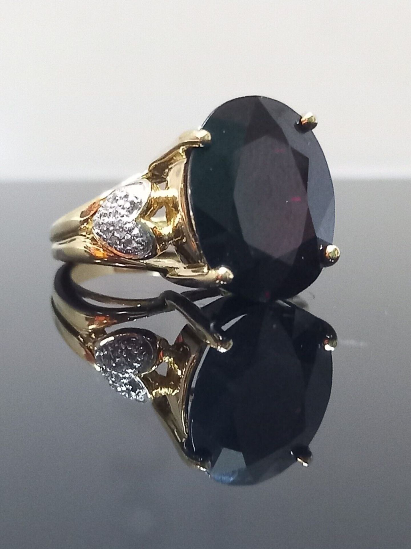 LARGE OVAL GARNET & DIAMOND RING 9CT YELLOW GOLD