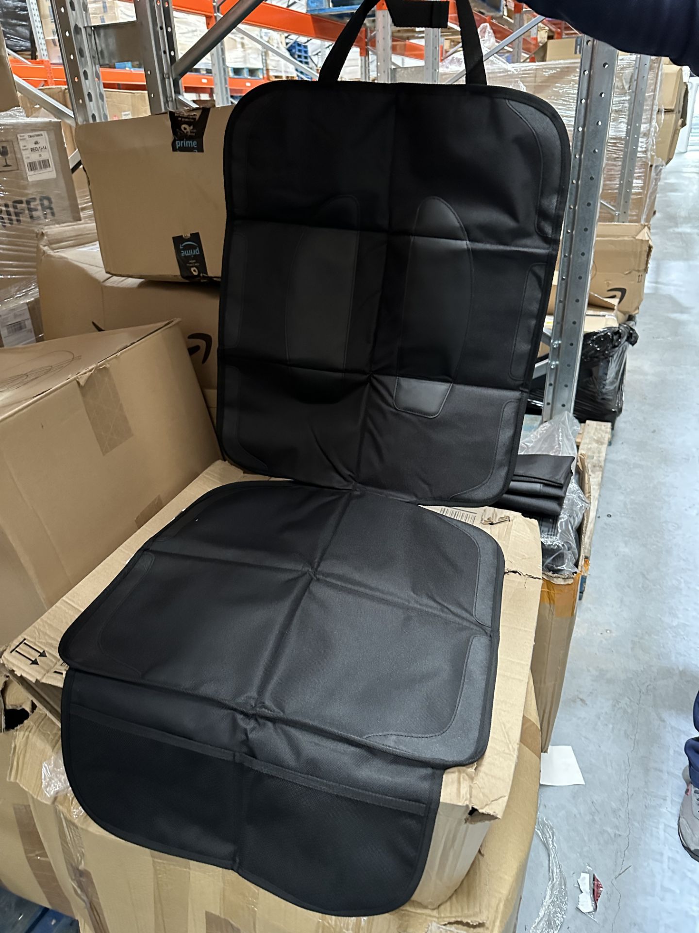 PALLET OF CAR SEAT COVER PACK OF 2 APPROX 150 PACKS