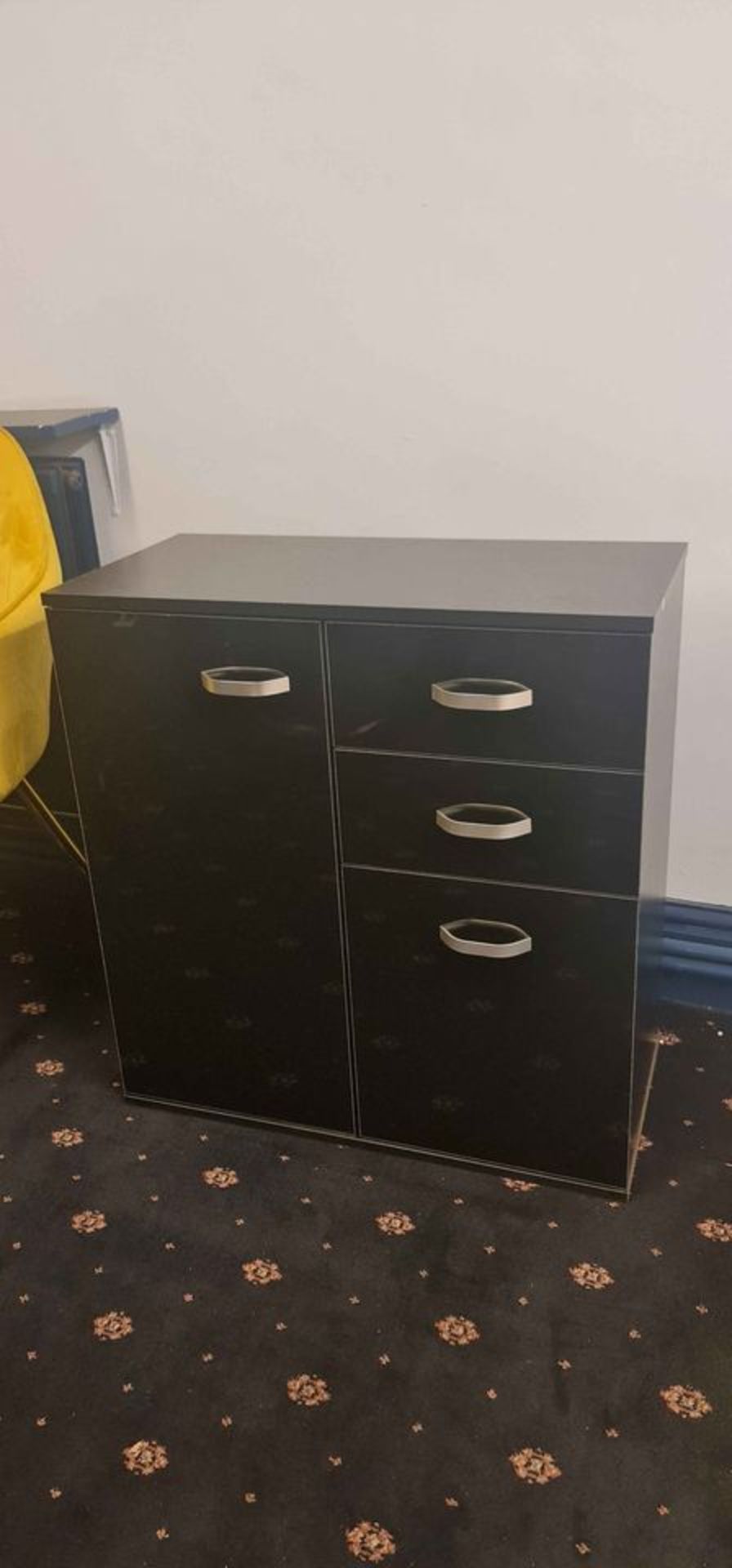 BLACK SIDEBOARD WITH HIGH GLOSS FINISH TO FRONTS AND METAL HANDALS