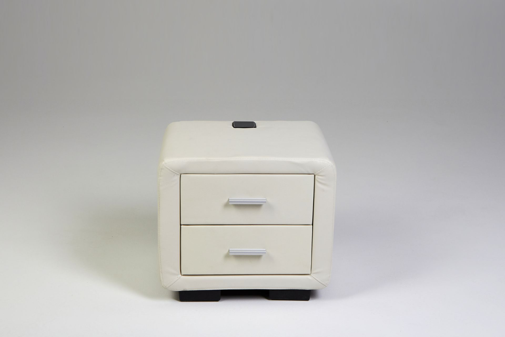 WHITE LEATHER BEDSIDE WITH BUILT IN RECHARGEABLE POP UP BLUETOOTH SPEAKER