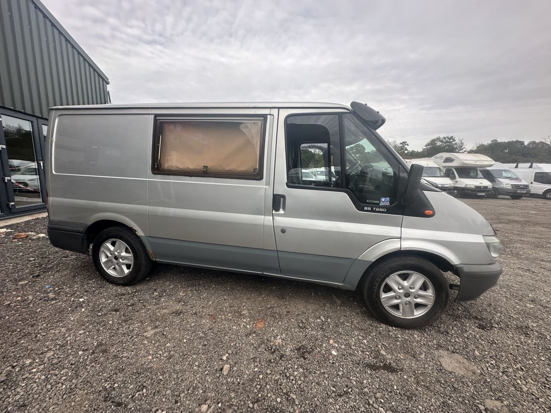 "READY FOR THE OPEN ROAD: FORD TRANSIT SILVER CAMPER (NO VAT ON HAMMER)**