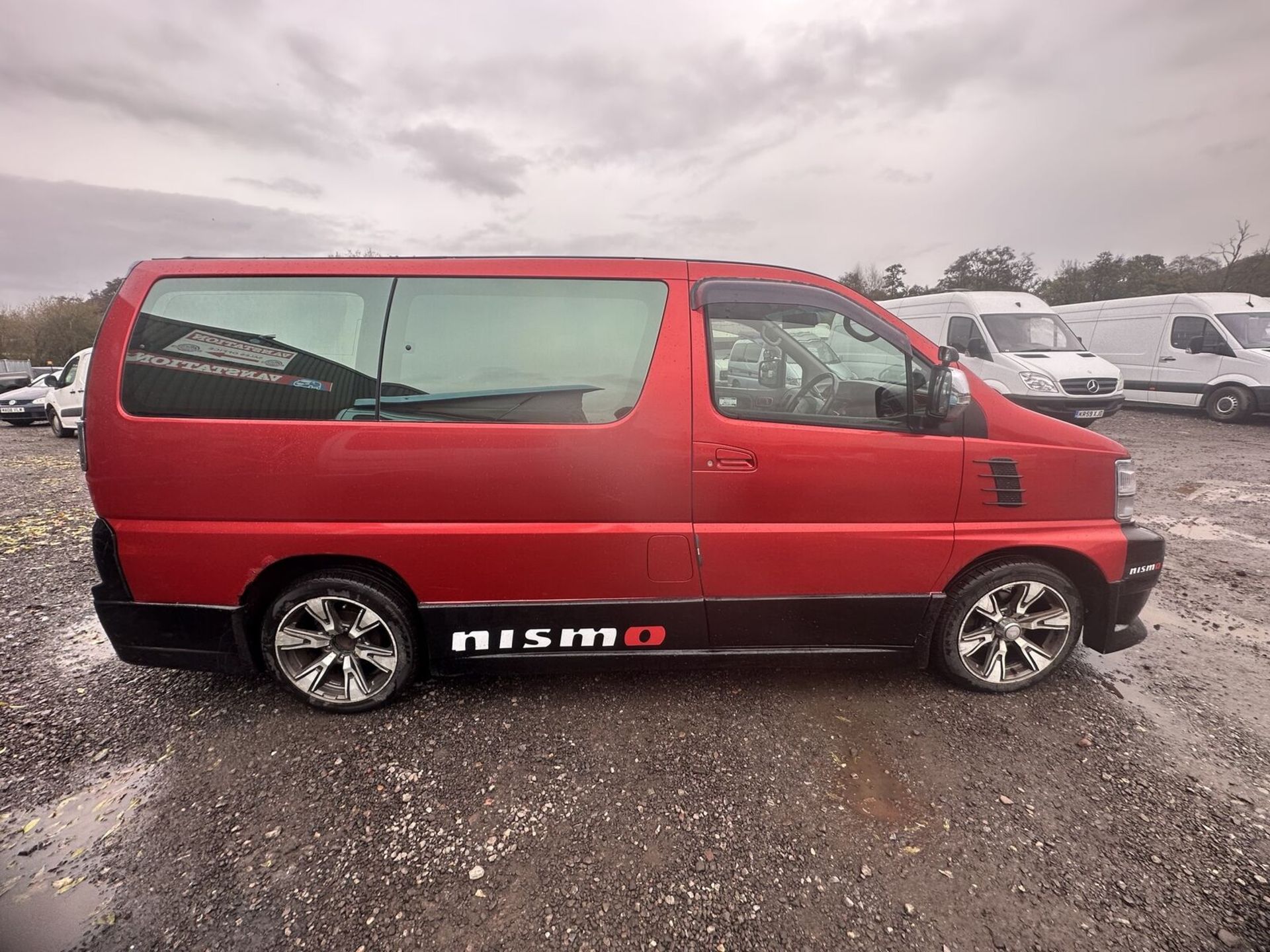 1999 NISSAN ELGRAND DIESEL CAMPER: ADVENTURE-READY IN RED/BLACK (NO VAT ON HAMMER)