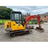 SOLID TRACKS, STRONG DIGGER: 1994 JCB 803 WITH PERKINS ENGINE