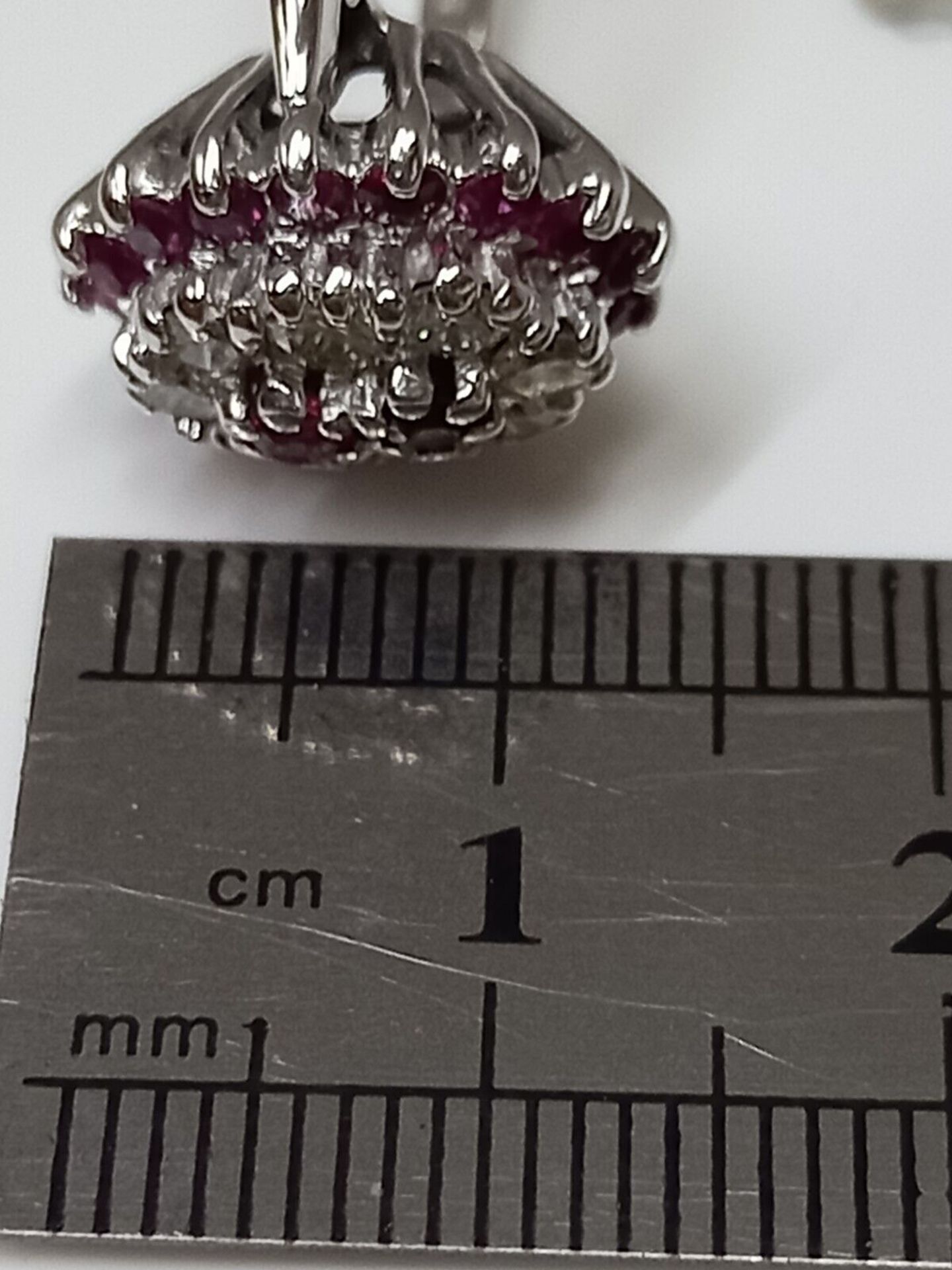 RUBY & 0.55CT DIAMOND CLUSTER RING 18CT WHITE GOLD + GIFT BOX + VALUATION CERTIFICATE OF £3500 - Image 6 of 7