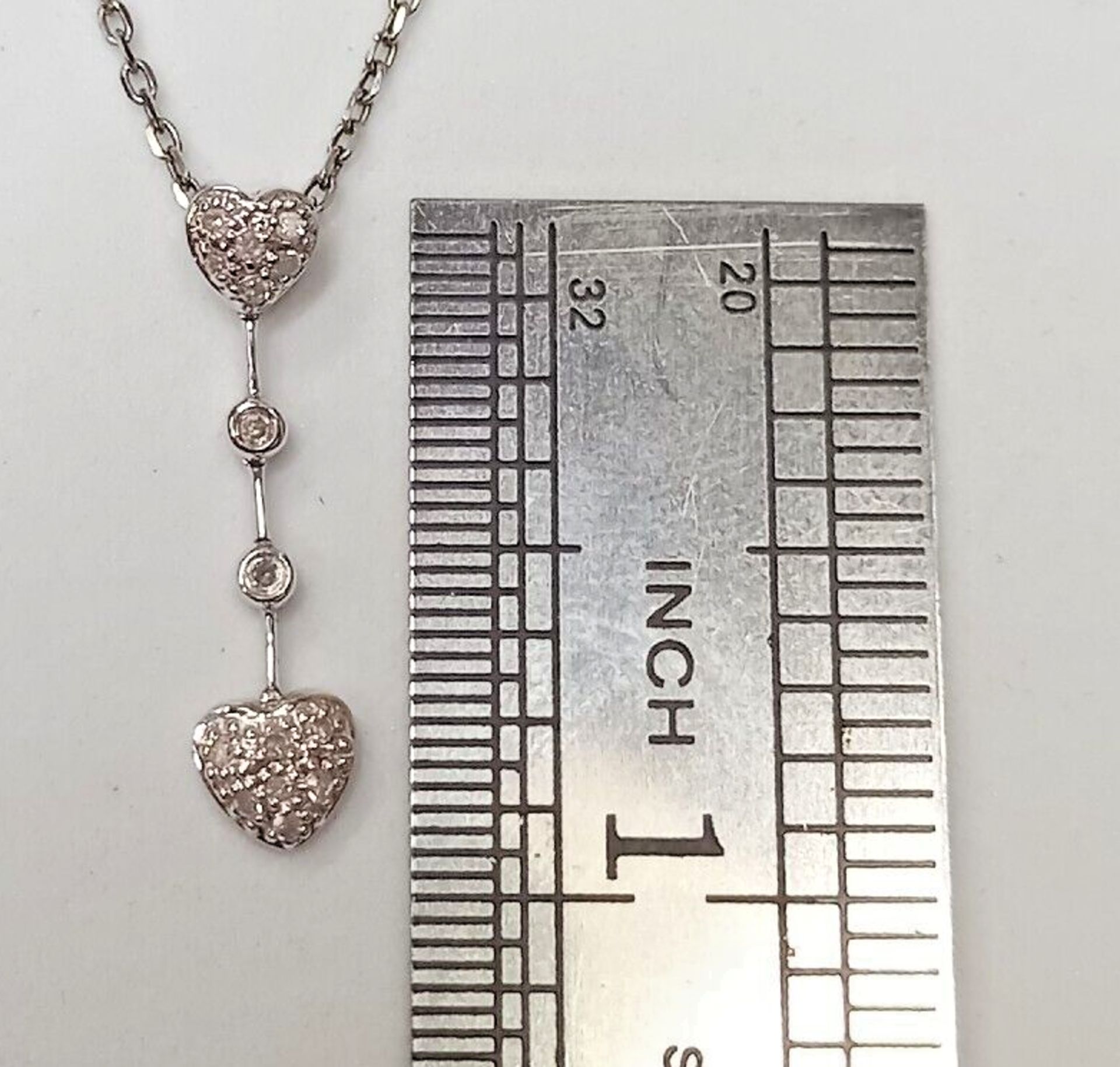 0.24CT DIAMOND HEART SHAPED PENDANT/9CT WHITE GOLD IN GIFT BOX WITH VALUATION CERTIFICATE OF £850 - Image 4 of 4