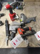 Assorted pneumatic tools including saw, nut gun, nail gun, pop riveter, mastic gun