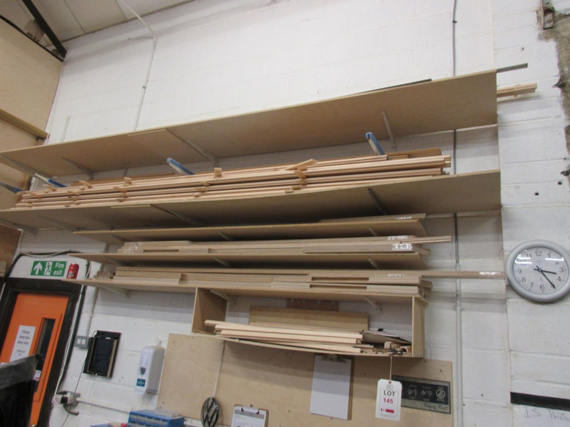 Contents of shelves including solid timber corner posts, plywood profiles etc., as lotted