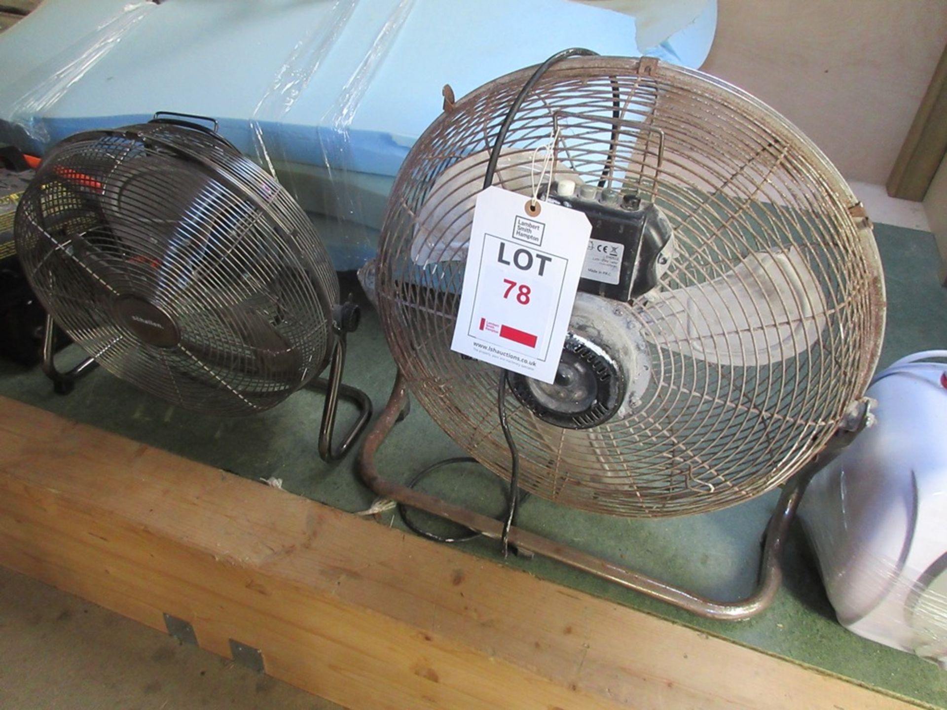 Two various floor fans
