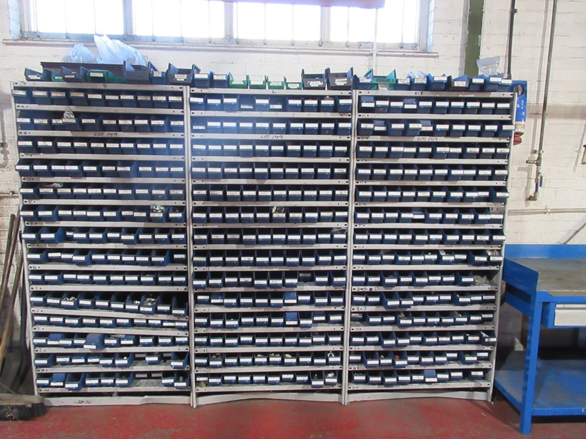 Three Parts racks each approx. 930mm x 470mm x 1900 high, with contents of parts bins & hydraulic